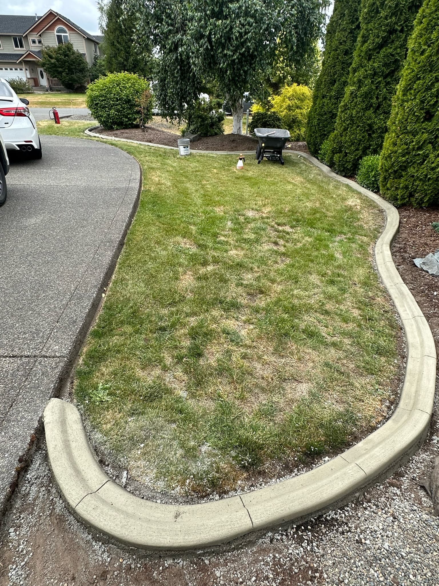 Landscape curbing installation by Material Masters Concrete