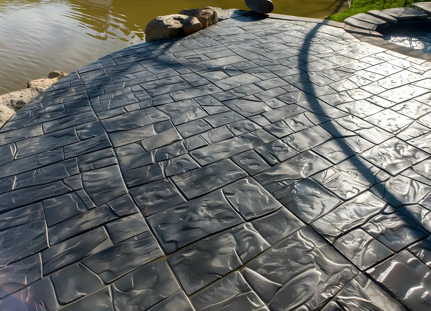 Decorative stamped concrete driveway in Olympia WA with modern residential curb appeal