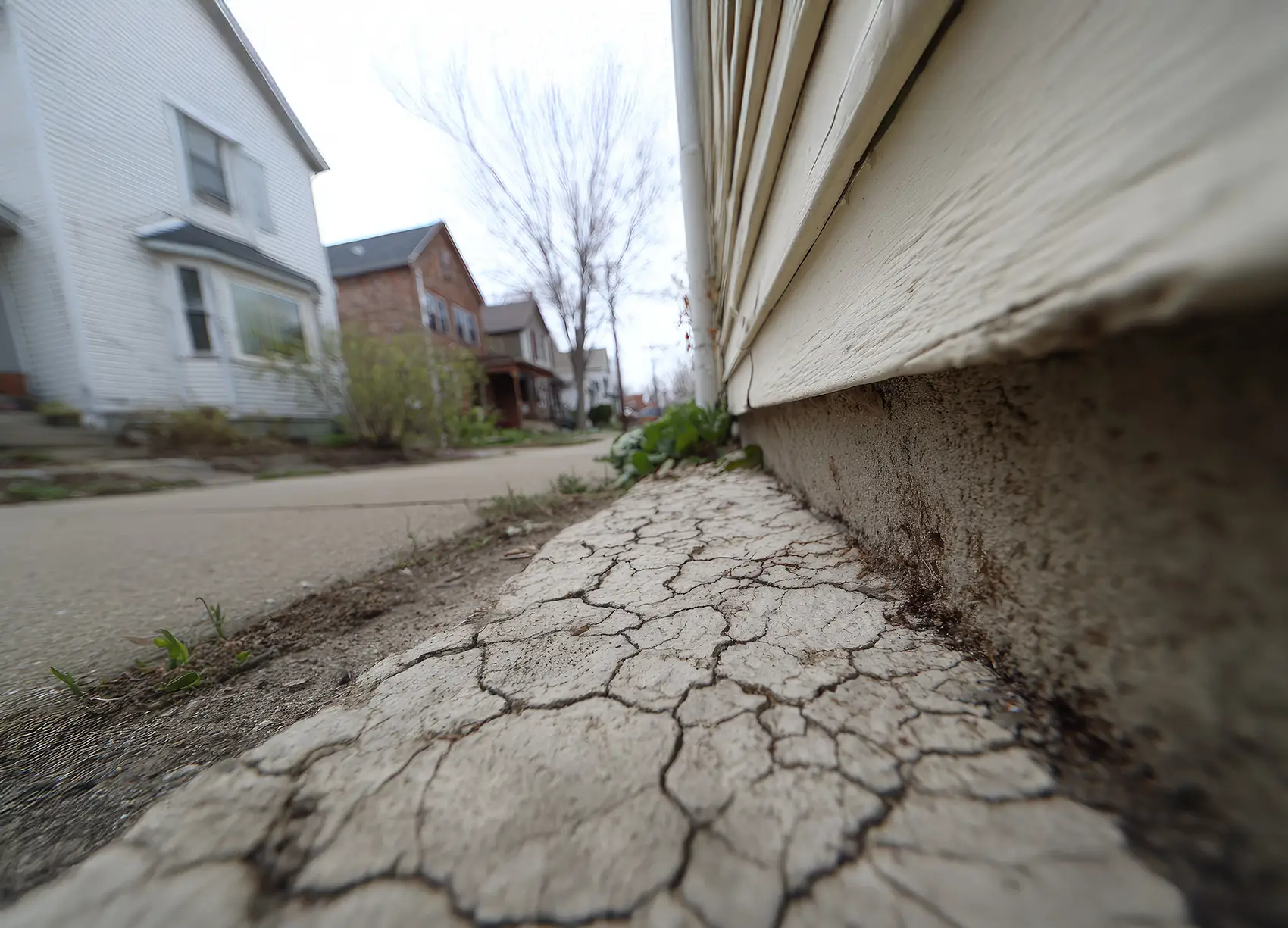 Concrete curbing problems in Centralia WA showing cracking sinking and frost heave damage from improper installation